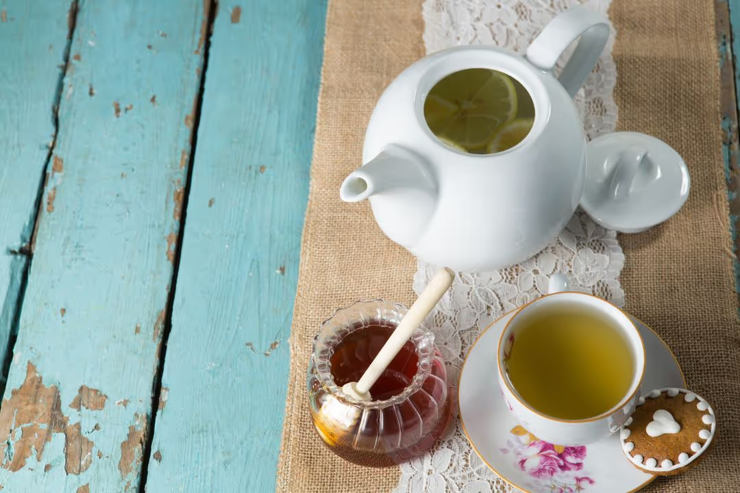 A refreshing cup of green tea, rich in antioxidants, served in a traditional teacup.